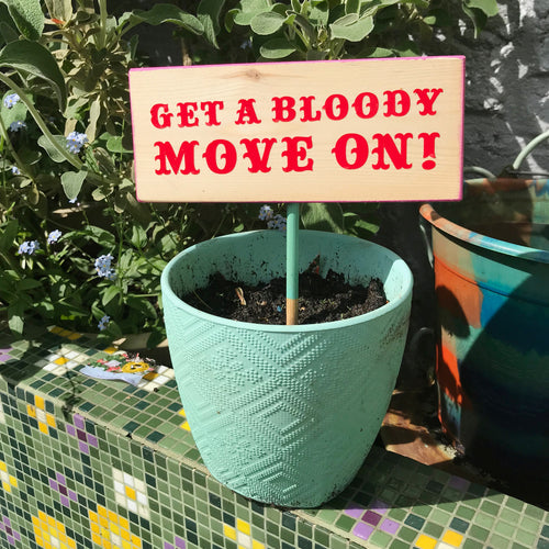 'Get a bloody move on' garden sign
