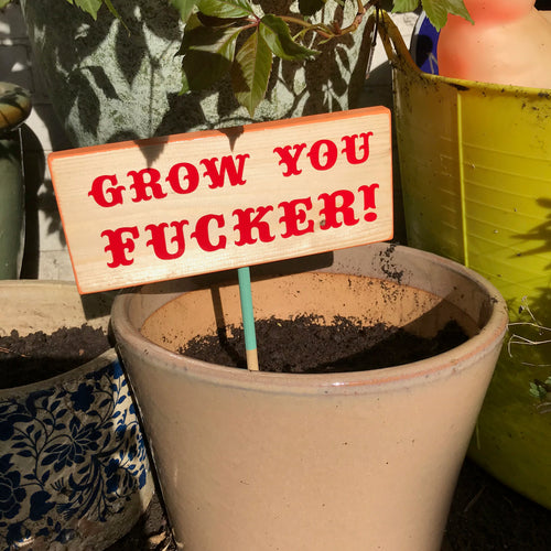 'grow you fucker' garden sign