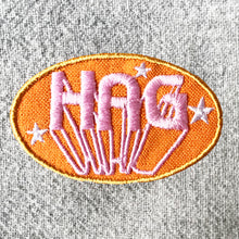 HAG iron-on clothes patch