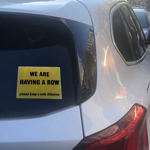 'WE ARE HAVING A ROW' car sticker